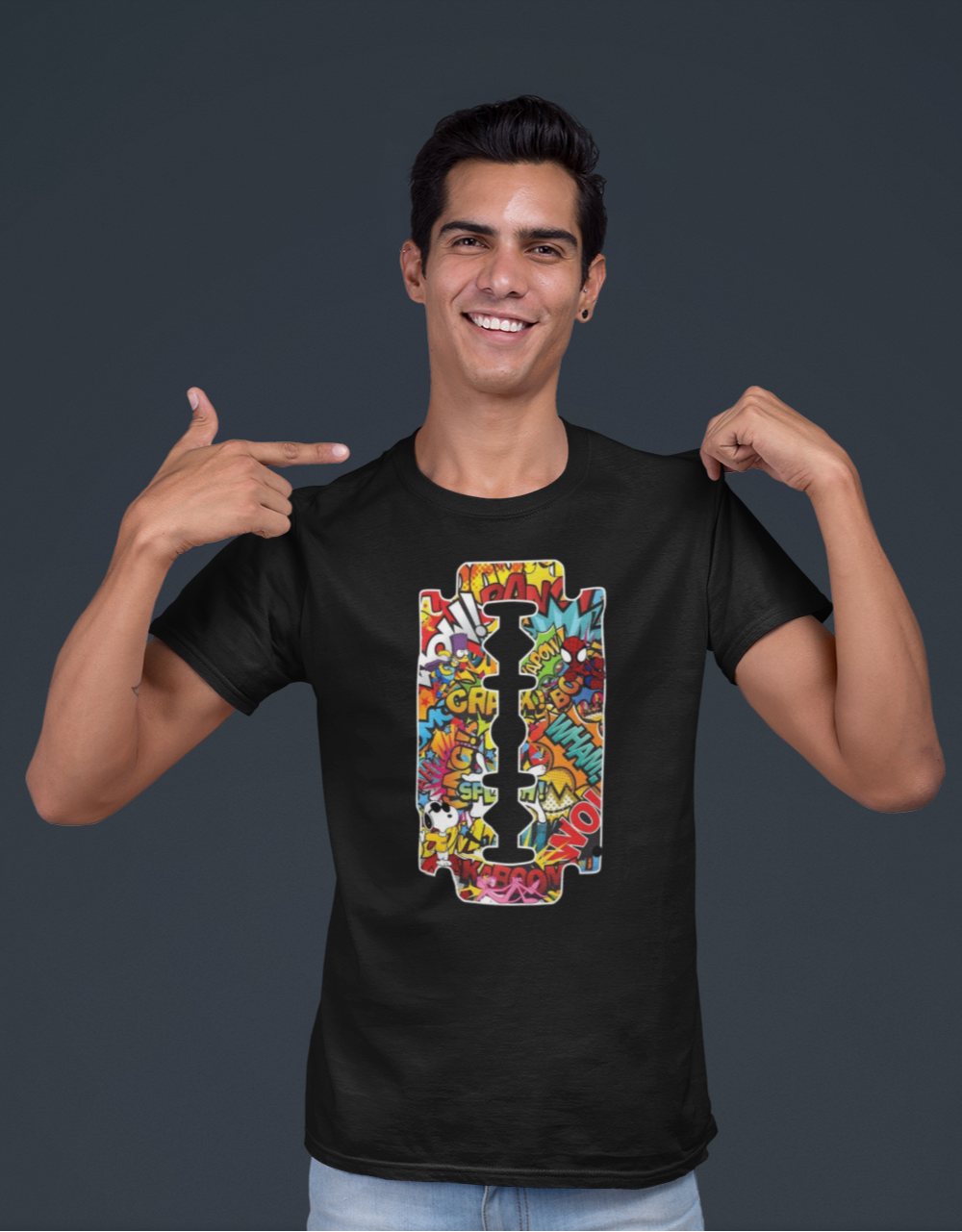 Man wearing a black t-shirt with a colorful graphic design on a dark background